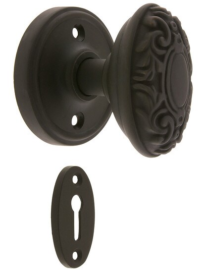 Classic Rosette Mortise Lock Set With Decorative Oval Knobs in Oil-Rubbed Bronze finish.